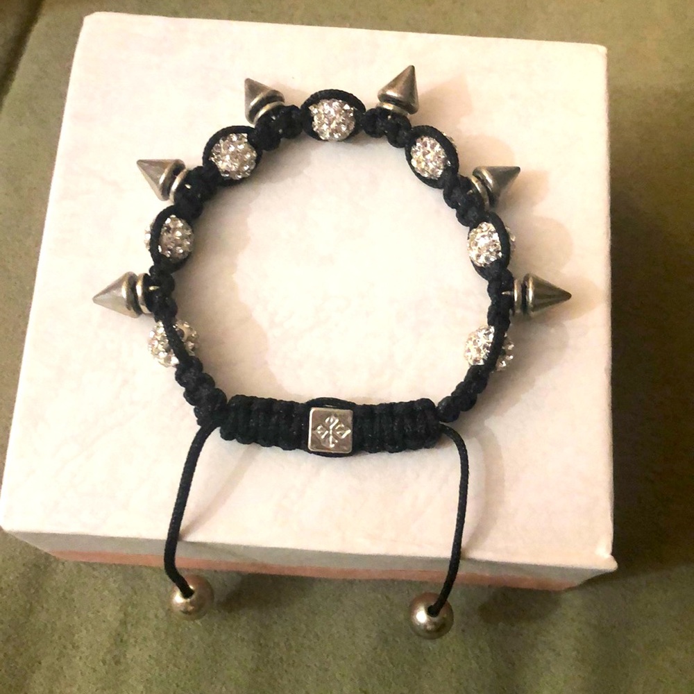 Spikes on a bracelet. Crystals.